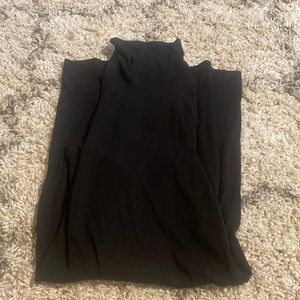 Long sleeve, tight black turtleneck dress